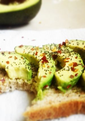 A picture of Avocado toast with poppy seeds.