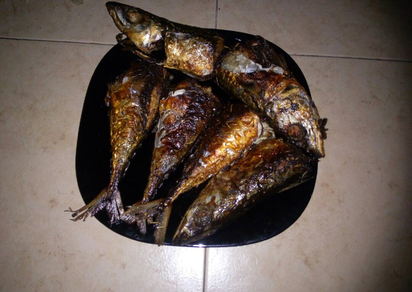 Deep fried fish soaked in red wine...