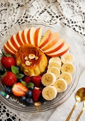 صورة لوصفة سناك صحن الفواكه🍇🍓🍎🍌 بالفلان كراميل 🍮