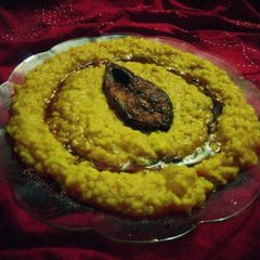 A picture of Bengali iLish khichri/ Hilsha Fish Fry with Liquid khichri.