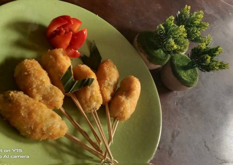 112. Kaki Naga Ayam Keju