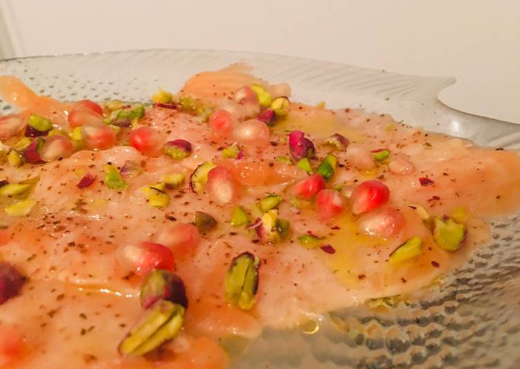 Carpaccio di salmone alla melagrana