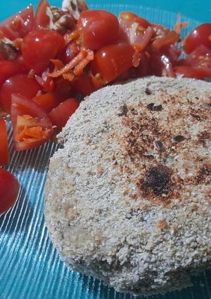 Una foto de Milanesa de porotos aduki y arroz yamaní integral