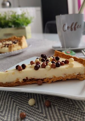 Una foto de Tartaleta de crema de queso y chocolate blanco