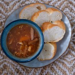 A picture of Tomato Soup with Bread.
