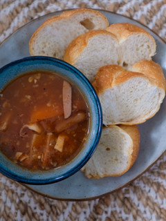 A picture of Tomato Soup with Bread.