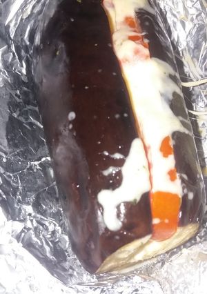 Una foto de BERENJENAS RELLENAS AL HORNO ENVUELTO EN PAPEL ALUMINIO