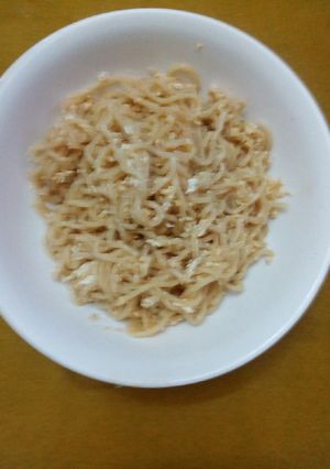 A picture of Noodles fried with egg.