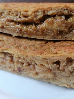 Una foto de Tortilla de chips y mejillones escabeche