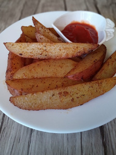 Una foto de Papas rústicas al horno