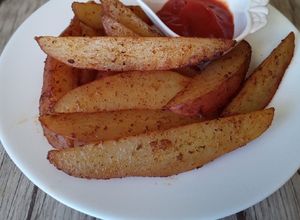 Una foto de Papas rústicas al horno