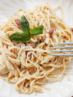 Una foto de Pasta con salsa de nata y tomates secos