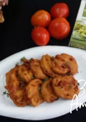 A picture of Tomato Kasuri Methi Pakoras.