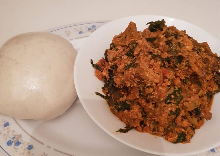Egusi soup with spinach and tuwo shikafa
