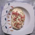 Patatas asadas rellenas de queso y beicon