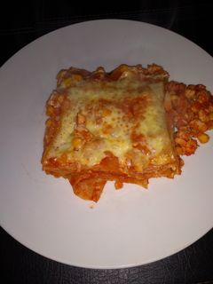 Una foto de Lasaña pollo maíz