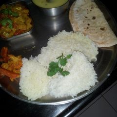 A picture of Gujarati kadi and kakdi tamater ki sabji.