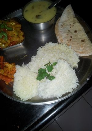 A picture of Gujarati kadi and kakdi tamater ki sabji.