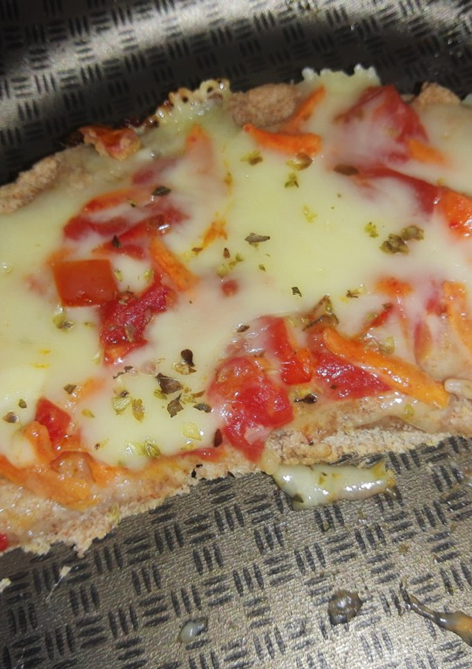 Una foto de Pizza saludable con masa integral 😋