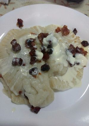 Una foto de Varenikes de papa con panceta salada