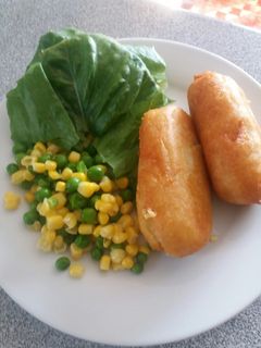 Una foto de Papas rellenas con queso y jamón