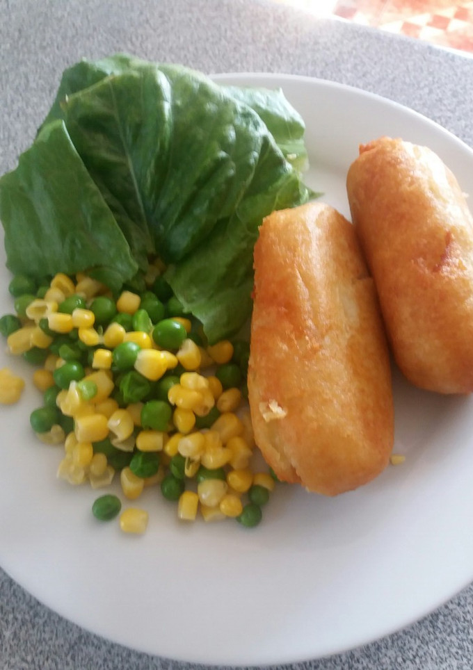 Una foto de Papas rellenas con queso y jamón