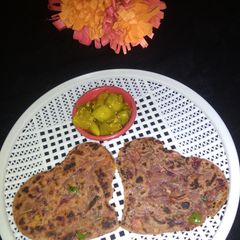 A picture of Pav bhaji heart Paratha.