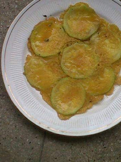 A picture of Lauki bachka (bottle gourd fritters).