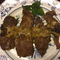 A picture of 400. California Farm Seitan Mock Beef in Rendang Sauce.