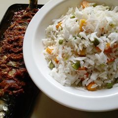 A picture of Coconut rice and fish.