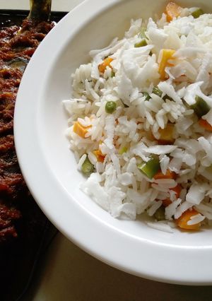 A picture of Coconut rice and fish.