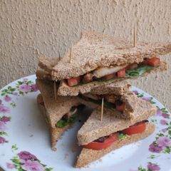A picture of Grilled chicken sandwich with wheat bread.