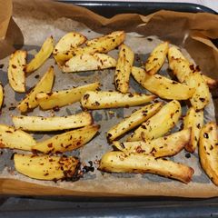 A picture of Potato wedges.