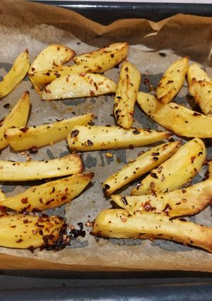 A picture of Potato wedges.