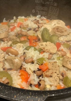 A picture of Black-eyed pea and sausage jambalaya in rice cooker.