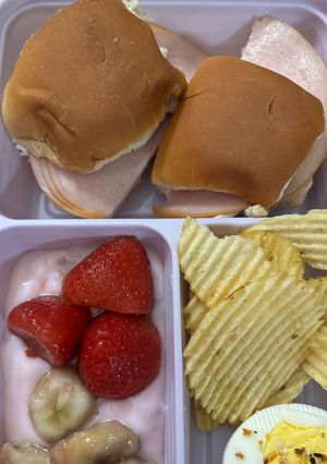 A picture of Turkey & cheese sliders Bento box.