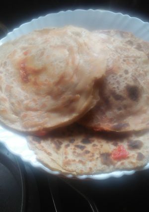 A picture of Paneer stuffed lachha paratha.