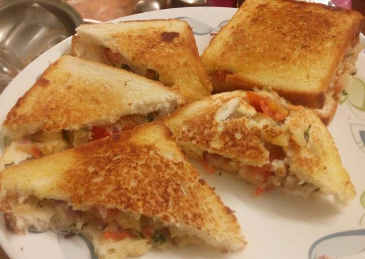 Step-by-Step Guide to Prepare Any-night-of-the-week Cheesy vegetable bread sandwich