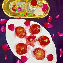 A picture of Rakhi Special Mawa Stuffed Plum Gulab Jamun : No Oil, No Ghee.