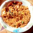 Jollof rice with fried plantain and fish