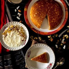 A picture of Poda pitha or burnt pitha is a slow cook pitha made from black gram fermented rice.