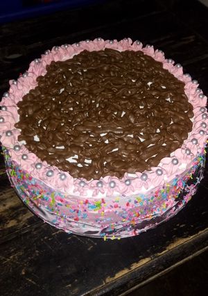 Una foto de Torta de crema y chocolate