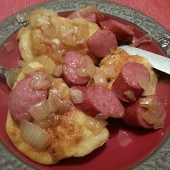 A picture of Perogies with Kielbasa and Onion.