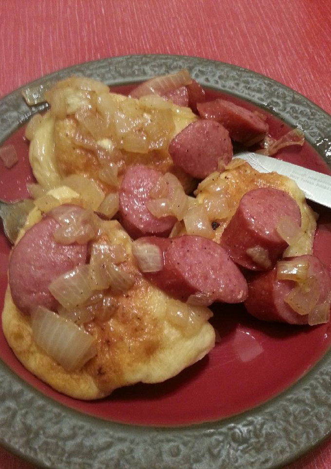 A picture of Perogies with Kielbasa and Onion.