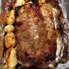 A picture of Baked Ribs with Potato.
