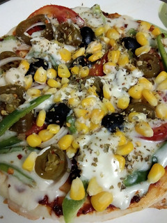A picture of Cheesy pan pizza.