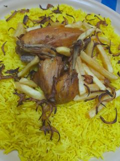 صورة لوصفة أرز مشخول بالكركم والسنوت💛