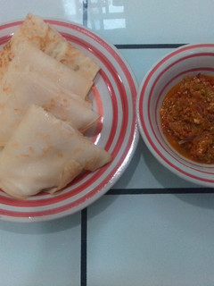 A picture of Crepes with egg and pepper sauce.