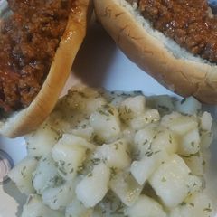 A picture of Hotdogs with Marinara Meat Sauce.