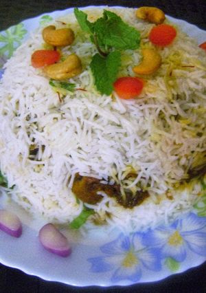 A picture of Upside Down Chicken Biryani.
